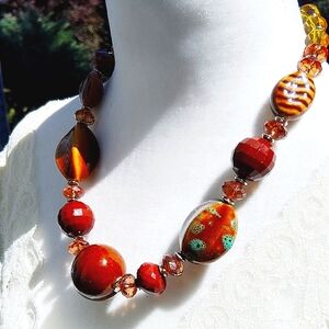 Brown Beaded Glass Necklace with Organic Patterns and Glossy Finish